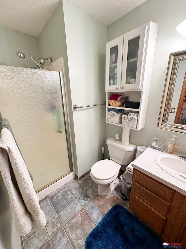 1507 SW 13th St, Lincoln, NE 68522 - full bathroom with a stall shower, toilet, and vanity