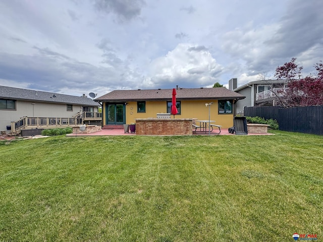 1507 SW 13th St, Lincoln, NE 68522 - back of house featuring a patio and a wooden deck