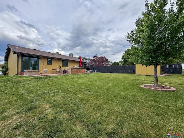 1507 SW 13th St, Lincoln, NE 68522 - view of yard with a patio