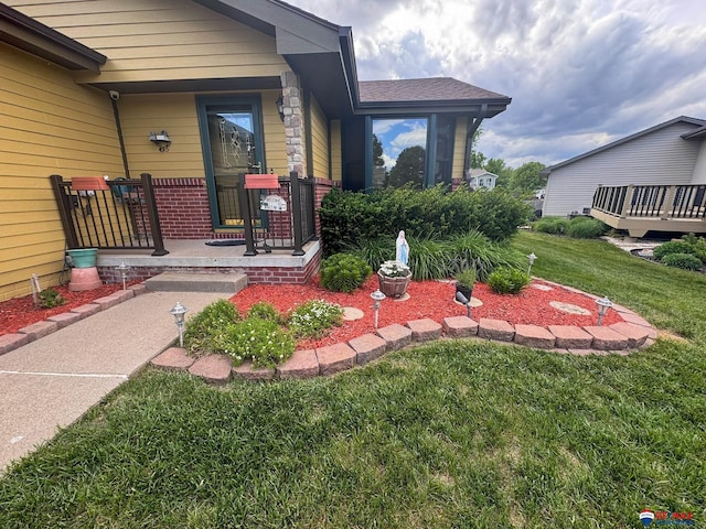 1507 SW 13th St, Lincoln, NE 68522 - entrance to property with a lawn, covered porch, and brick siding