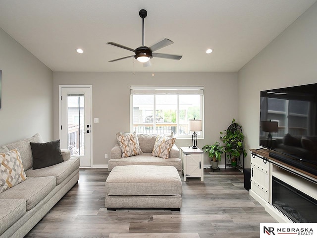 4062 W Gary Gately St, Lincoln, NE 68528 - living room featuring a ceiling fan, recessed lighting, baseboards, and wood finished floors
