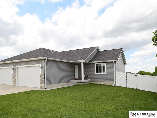 4062 W Gary Gately St, Lincoln, NE 68528 - ranch-style house featuring an attached garage, roof with shingles, and concrete driveway