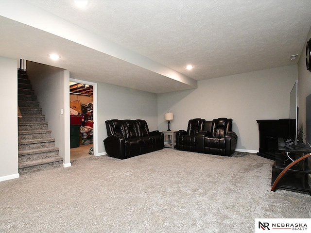4062 W Gary Gately St, Lincoln, NE 68528 - living area with carpet floors, baseboards, stairway, recessed lighting, and a textured ceiling