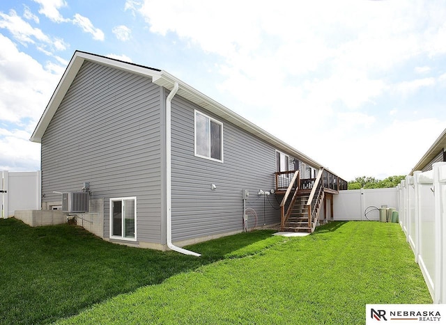 4062 W Gary Gately St, Lincoln, NE 68528 - back of house featuring central AC unit, stairs, and a wooden deck