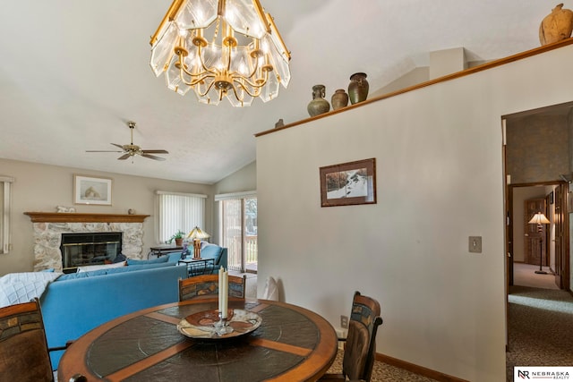 5082 S 149th Ct, Omaha, NE 68137 - dining area with carpet flooring, lofted ceiling, a ceiling fan, a high end fireplace, and baseboards