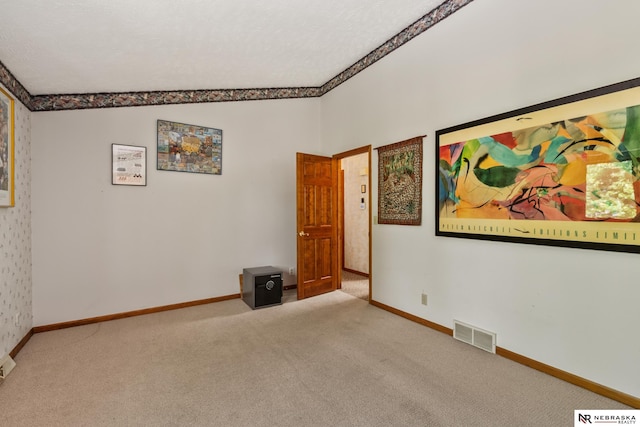 5082 S 149th Ct, Omaha, NE 68137 - carpeted empty room featuring baseboards and lofted ceiling