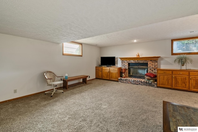 5082 S 149th Ct, Omaha, NE 68137 - carpeted living area with a textured ceiling, a brick fireplace, healthy amount of natural light, and baseboards