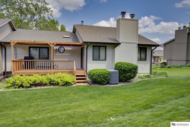 5082 S 149th Ct, Omaha, NE 68137 - back of property featuring central AC unit, a shingled roof, a chimney, a lawn, and a deck