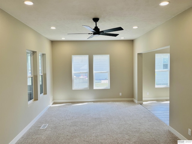 6916 N 24th St, Omaha, NE 68112 - spare room with carpet flooring, recessed lighting, ceiling fan, and baseboards