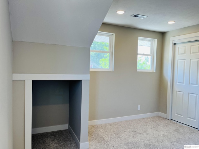 6916 N 24th St, Omaha, NE 68112 - unfurnished bedroom with baseboards, carpet flooring, and recessed lighting