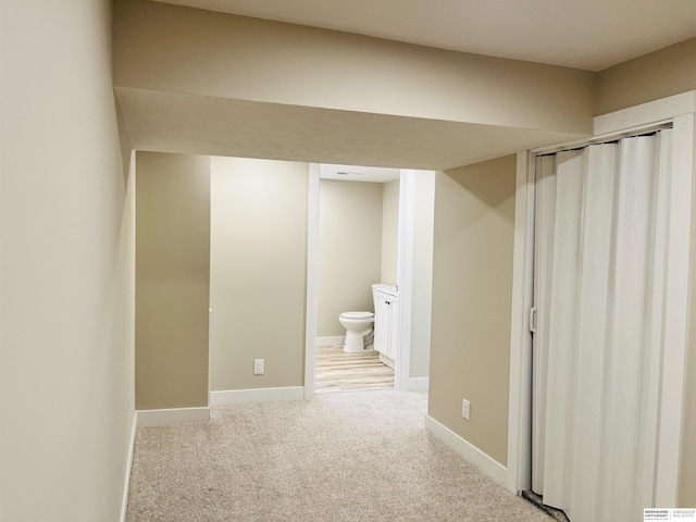 6916 N 24th St, Omaha, NE 68112 - corridor with light colored carpet and baseboards