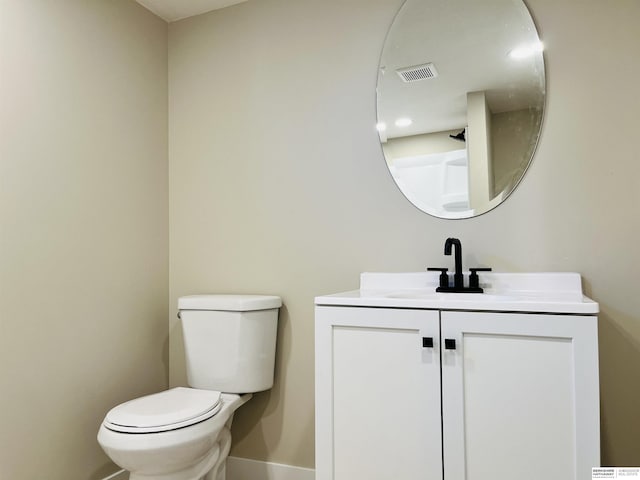 6916 N 24th St, Omaha, NE 68112 - bathroom with vanity, toilet, and baseboards