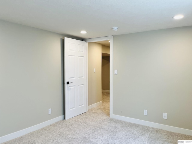 6916 N 24th St, Omaha, NE 68112 - carpeted empty room with recessed lighting, a smoke detector, and baseboards