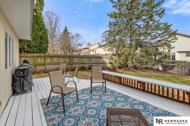926 Iron Rd, Papillion, NE 68046 - wooden terrace featuring a fenced backyard and grilling area