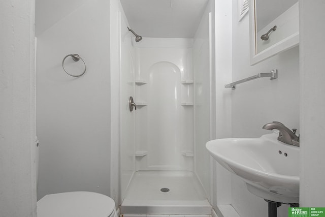 1320 N 40th St, Omaha, NE 68131 - full bathroom with a shower stall, toilet, and a sink