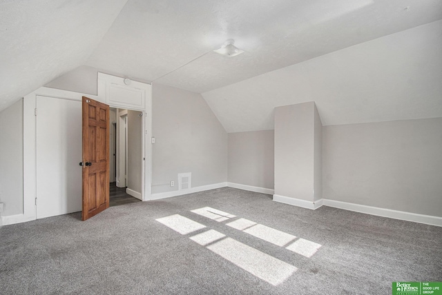 1320 N 40th St, Omaha, NE 68131 - bonus room featuring carpet, vaulted ceiling, and baseboards