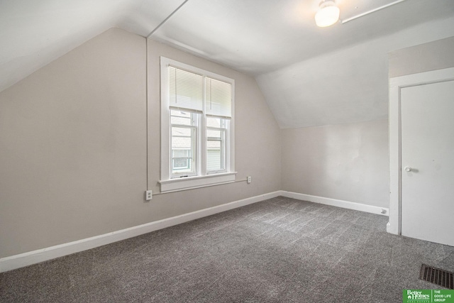 1320 N 40th St, Omaha, NE 68131 - bonus room featuring lofted ceiling, carpet, and baseboards