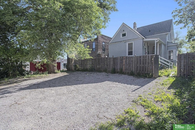 1320 N 40th St, Omaha, NE 68131 - view of home's exterior with a chimney