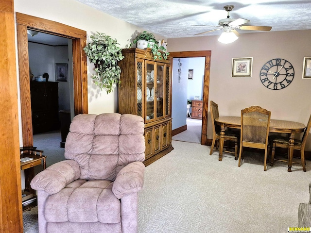 1112 10th St, Auburn, NE 68305 - dining room featuring carpet and ceiling fan