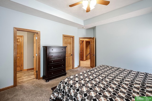 8112 Molokai Dr, Papillion, NE 68046 - bedroom featuring light carpet, baseboards, and ceiling fan