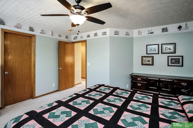 8112 Molokai Dr, Papillion, NE 68046 - bedroom with light carpet, a textured ceiling, a ceiling fan, and baseboards