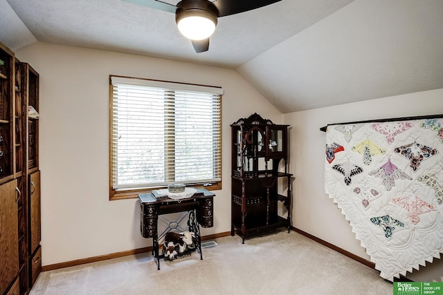 8112 Molokai Dr, Papillion, NE 68046 - home office featuring lofted ceiling, a ceiling fan, light colored carpet, and baseboards
