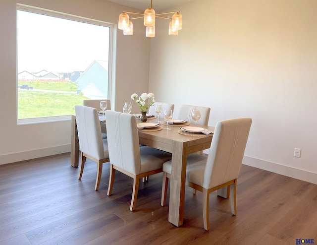 900 Middleton Ave, Lincoln, NE 68521 - dining room featuring baseboards and wood finished floors