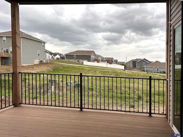 900 Middleton Ave, Lincoln, NE 68521 - wooden terrace featuring a residential view and a lawn