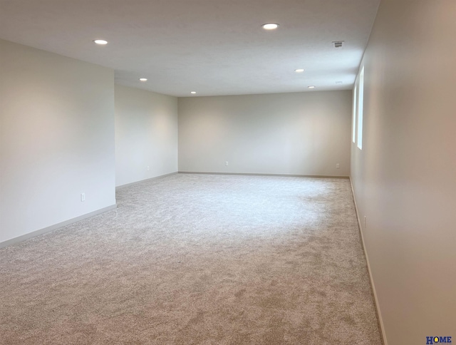 900 Middleton Ave, Lincoln, NE 68521 - spare room featuring carpet floors, recessed lighting, and baseboards