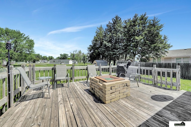 1206 W Ryons St, Lincoln, NE 68522 - wooden terrace featuring an outdoor fire pit
