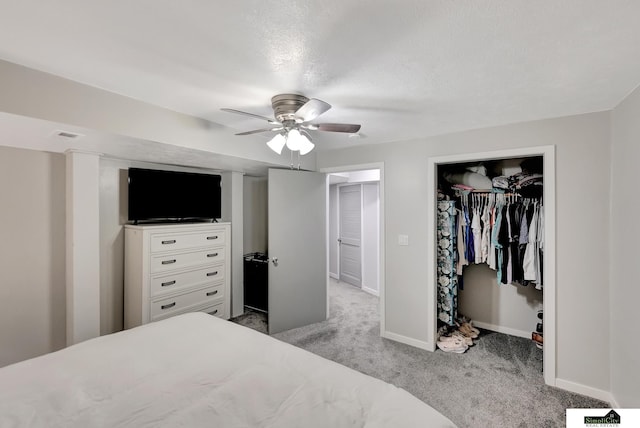 1206 W Ryons St, Lincoln, NE 68522 - bedroom featuring carpet flooring, baseboards, a ceiling fan, a closet, and a spacious closet