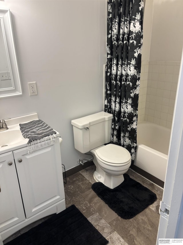 1231 S 121st Plz Unit 312, Omaha, NE 68144 - bathroom featuring toilet, vanity, shower / bath combination with curtain, and baseboards