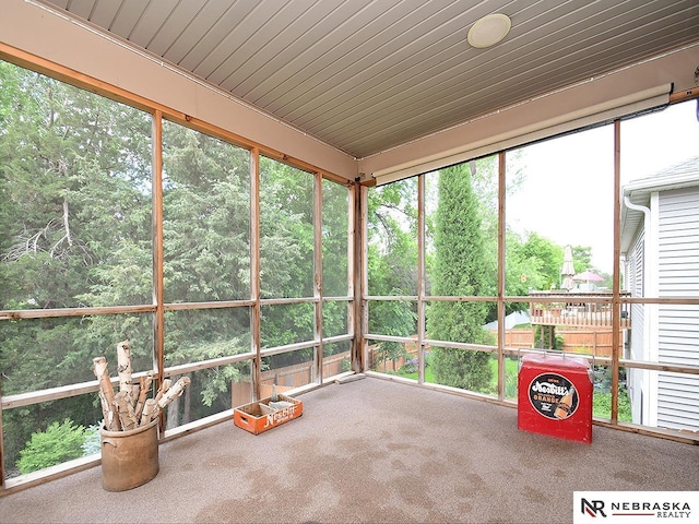 1853 SW 38th St, Lincoln, NE 68522 - unfurnished sunroom with carpet and wood ceiling