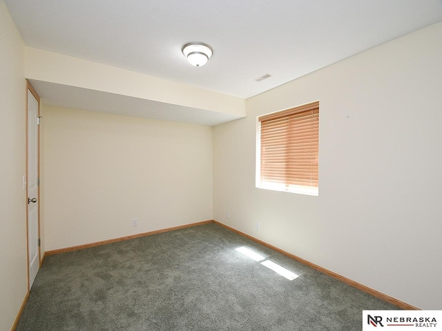 1853 SW 38th St, Lincoln, NE 68522 - carpeted spare room featuring baseboards