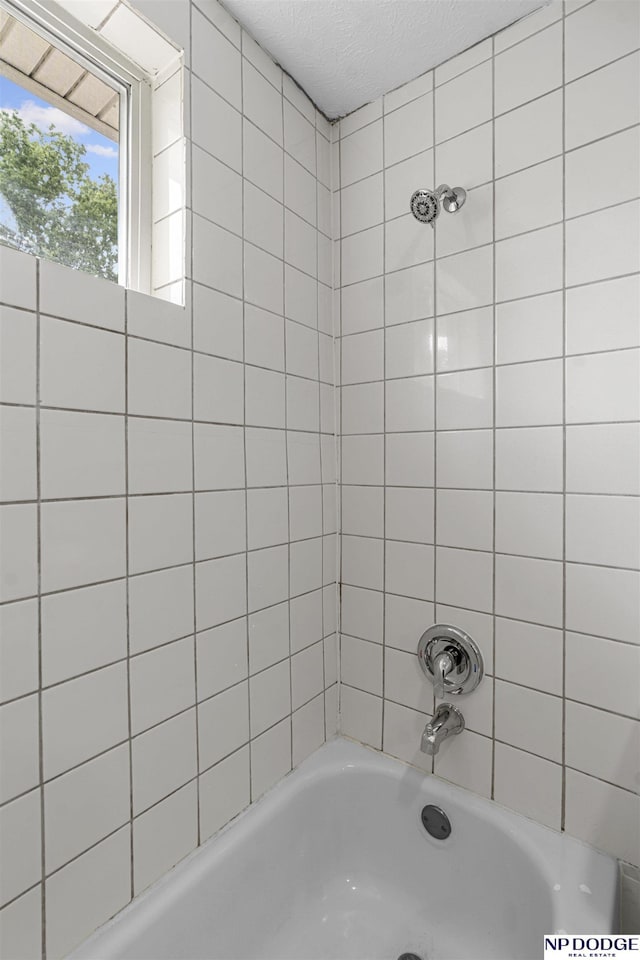 5435 S 18th St, Omaha, NE 68107 - full bath with  shower combination and a textured ceiling