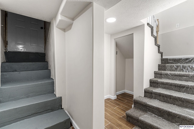 5435 S 18th St, Omaha, NE 68107 - stairway with baseboards and wood finished floors