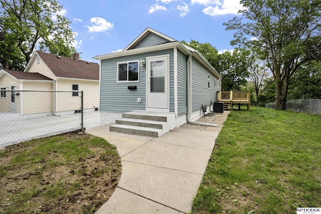 5437 S 18th St, Omaha, NE 68107 - shotgun-style home with a wooden deck and entry steps