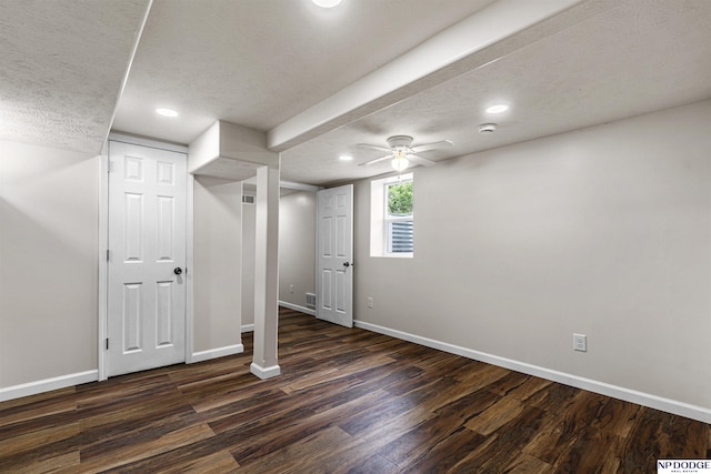 5437 S 18th St, Omaha, NE 68107 - basement with dark wood-type flooring, baseboards, a ceiling fan, recessed lighting, and a textured ceiling