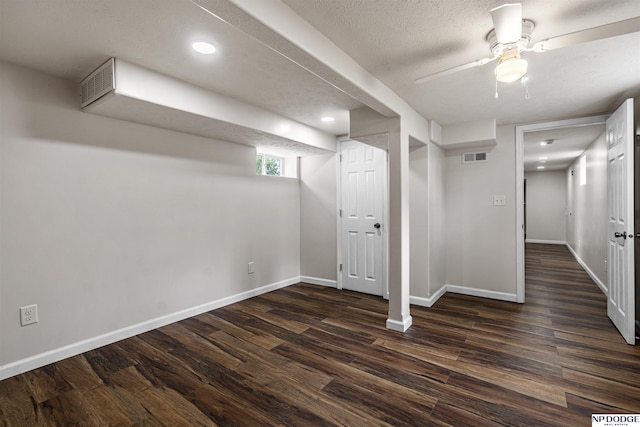 5437 S 18th St, Omaha, NE 68107 - below grade area featuring dark wood-style flooring, baseboards, a ceiling fan, and recessed lighting