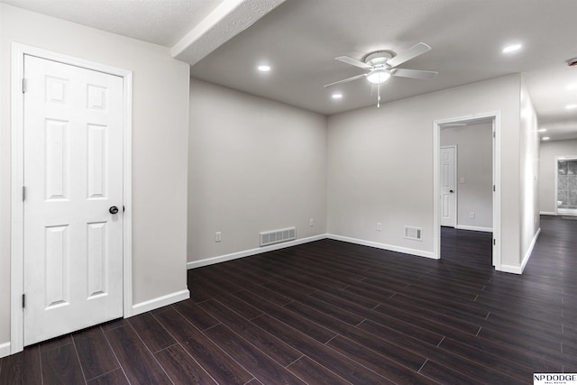 5437 S 18th St, Omaha, NE 68107 - unfurnished room with a ceiling fan, baseboards, dark wood-type flooring, and recessed lighting