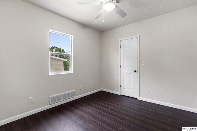 5437 S 18th St, Omaha, NE 68107 - unfurnished room with baseboards, dark wood-type flooring, and ceiling fan