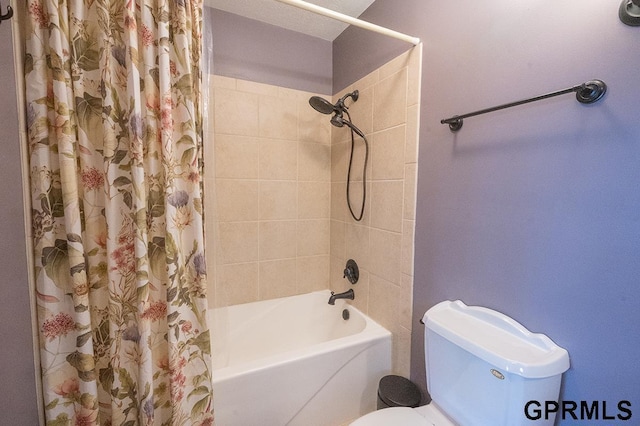 10755 Berry Plz, Omaha, NE 68127 - bathroom with shower / tub combo with curtain and toilet