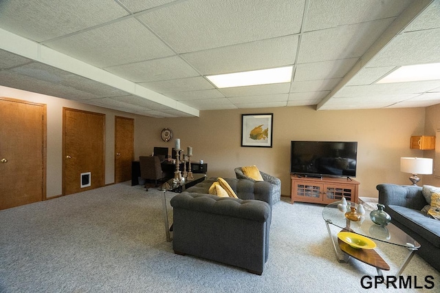 10755 Berry Plz, Omaha, NE 68127 - carpeted living area featuring a paneled ceiling