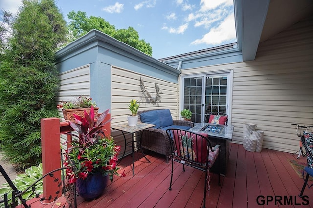 10755 Berry Plz, Omaha, NE 68127 - wooden terrace with an outdoor hangout area