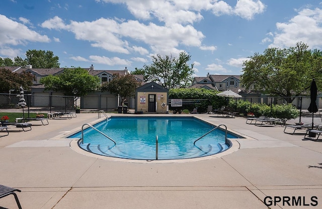 10755 Berry Plz, Omaha, NE 68127 - community pool with a patio