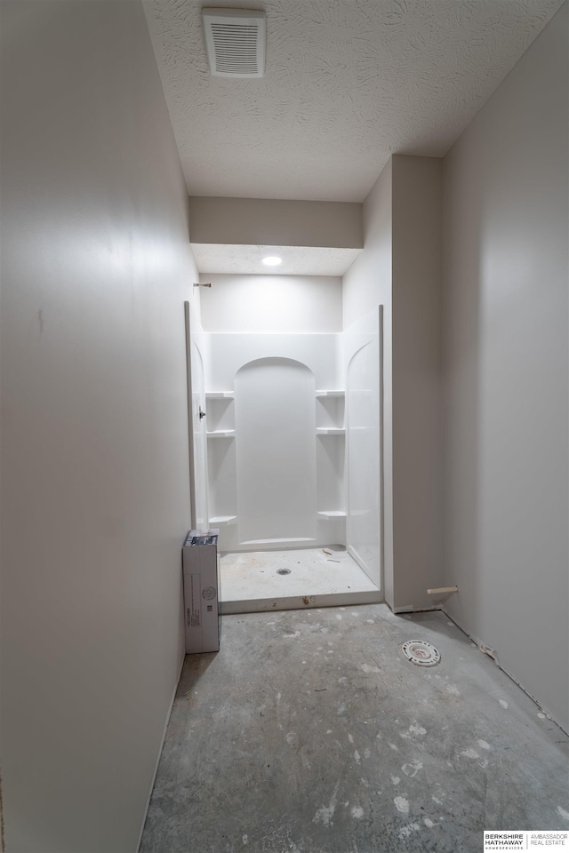5441 S 51st St, Omaha, NE 68117 - hall featuring a textured ceiling