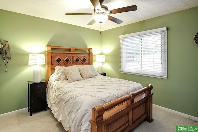 7535 S 76th St, La Vista, NE 68128 - bedroom featuring light carpet, baseboards, and a ceiling fan