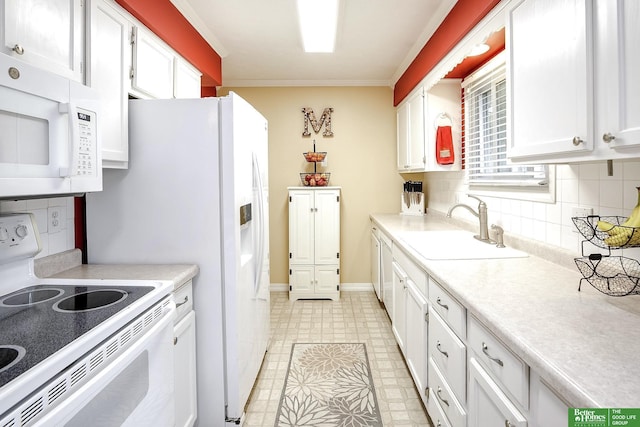 7535 S 76th St, La Vista, NE 68128 - kitchen with white appliances, a sink, white cabinetry, light countertops, and ornamental molding
