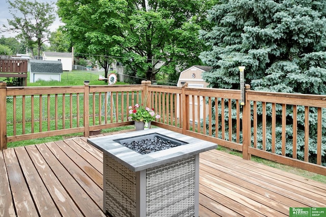 7535 S 76th St, La Vista, NE 68128 - wooden terrace featuring a fire pit
