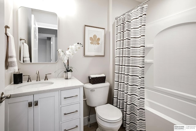 5445 S 51st St, Omaha, NE 68117 - bathroom featuring vanity, toilet, and shower / bath combo